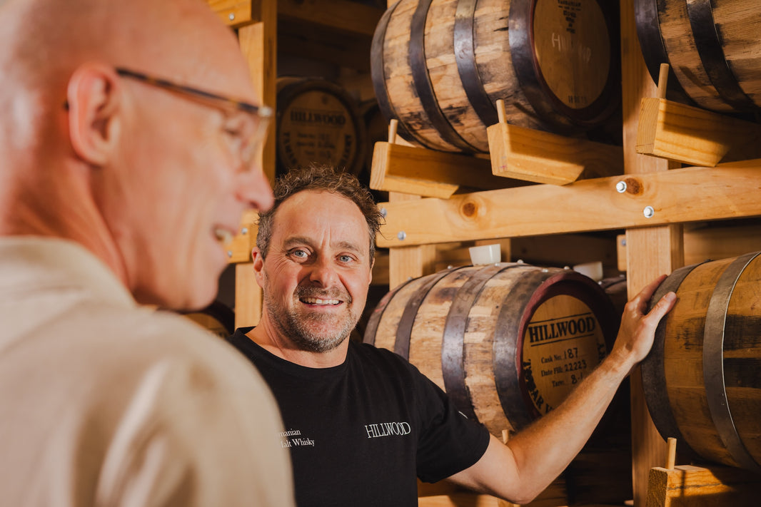 Ollie showing a distillery visitor around Hillwood Whisky Distillery and the handmade Hillwood Whisky casks.